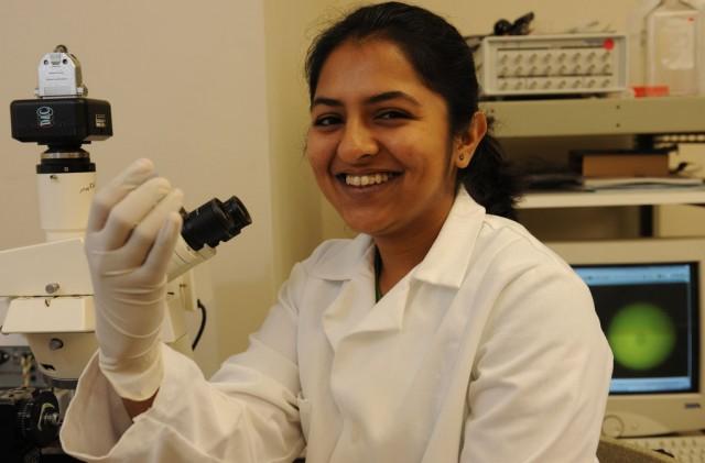 Student with a microscope