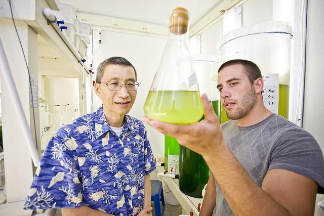 Student and teacher in chemistry lab