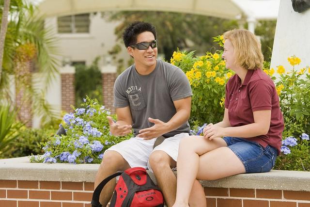 Two students talking outside