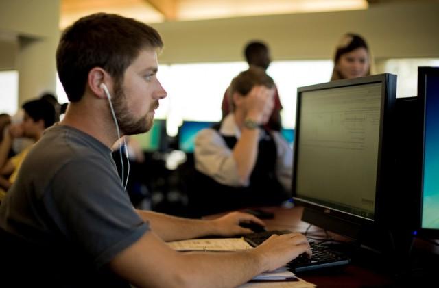 A student working in a computer lap